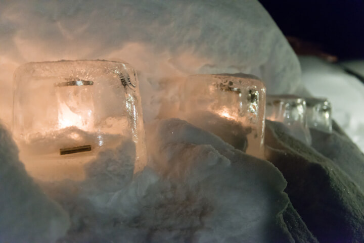 The light of a candle in the ice