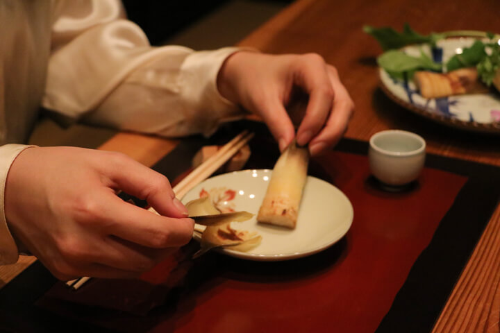 Peeling a bamboo-shoot