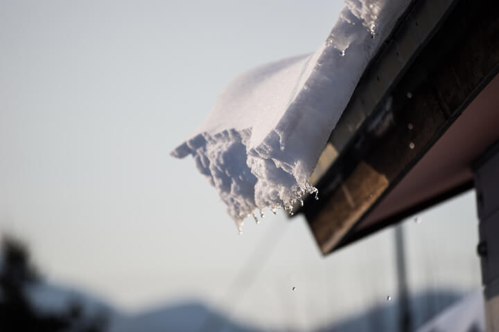 Heavy snow piles on the roof