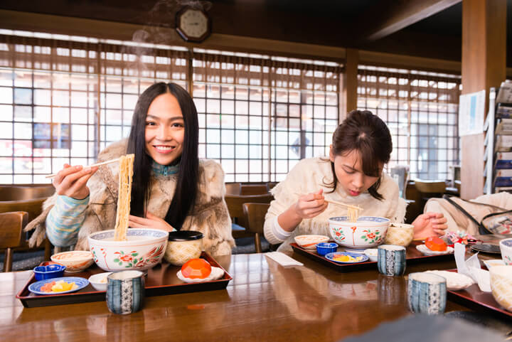 Girls eating ramen